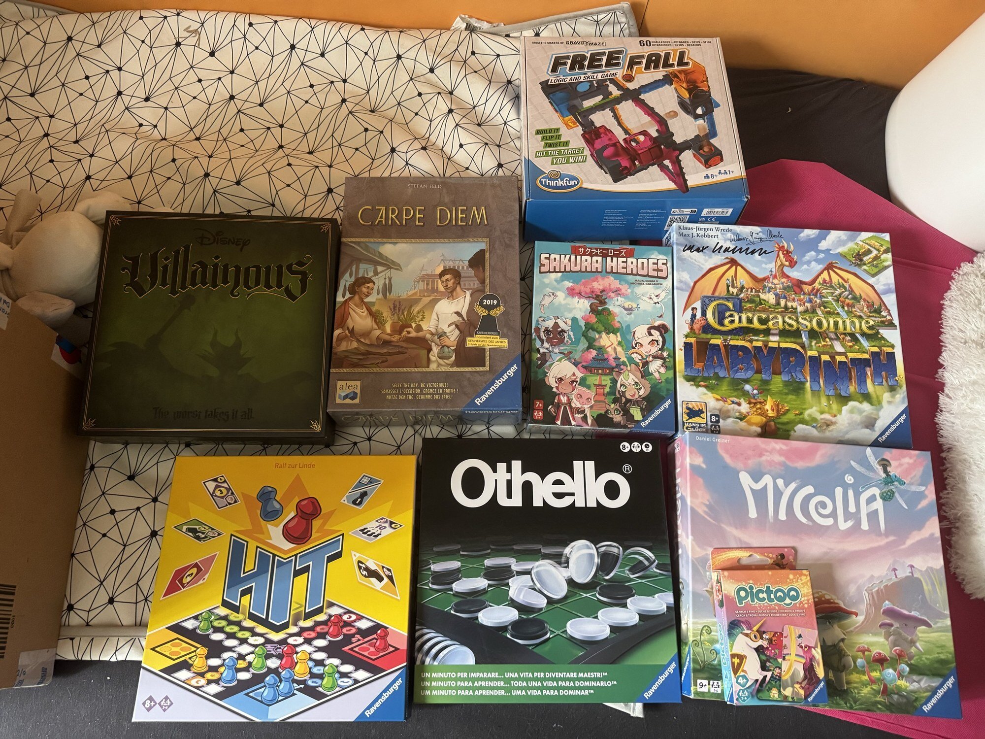 Le nove scatole Ravensburger in palio agli Italian Masters 2026: Carcassonne Labyrinth, Disney Villainous, Carpe Diem, Mycelia, Free Fall, Sakura Heroes, HIT, Othello e Pictoo